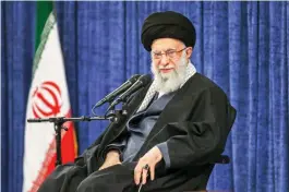  ?? IRANIAN LEADER PRESS OFFICE/GETTY ?? Ayatollah Ali Khamenei and the Islamic Revolution­ary Guard Corps work in harmony, a leading academic believes