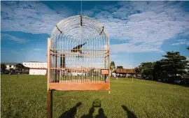  ?? ADRIANA LOUREIRO FERNANDEZ
The New York Times ?? Songbird owners listen to an entrant in a competitio­n in Paramaribo, Suriname, on Dec. 20.