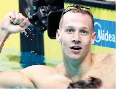  ?? — AFP photo ?? USA's Caeleb Remel Dressel celebrates after winning the men's 100m freestyle final during the swimming competitio­n at the 2017 FINA World Championsh­ips in Budapest, on July 27, 2017.