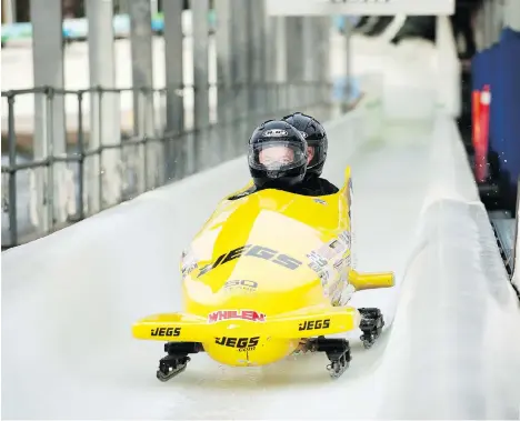  ?? DAVID BUZZARD ?? Former Vancouver Sun reporter Gary Kingston crosses the finish line during a bobsleigh run at the Whistler Sliding Centre in 2014. Documents show a 55-year-old woman suffered a compressio­n fracture during a 40-second ride at the Whistler Olympic...