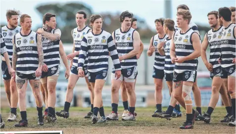  ?? Pictures: PAT SCALA ?? SEASON OVER: Lara players leave the field, perhaps for the final time in the GFL.