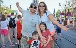  ?? / Diane Wagner ?? Nikki Kemp (right), her husband Terry Kemp and their children enjoy themselves at Disney World before Nikki opens Highland Rivers Health’s Mosaic Place outreach center in Cedartown this fall.