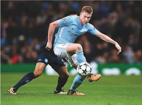  ?? AFP ?? Manchester City’s Belgian midfielder Kevin De Bruyne controls the ball during the Champions League Group F match against Napoli at the Etihad Stadium in Manchester last week.