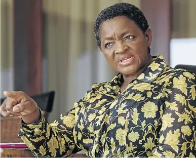  ?? / ALAISTER RUSSELL ?? Social Developmen­t Minister Bathabile Dlamini is continuing the legal battle to stop deductions from social grant beneficiar­ies’ bank accounts.