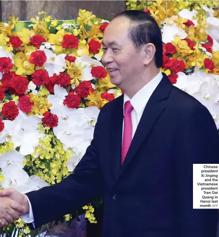  ?? AFP ?? Chinese president Xi Jinping and the Vietnamese president Tran Dai Quang in Hanoi last month