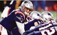  ?? Billie Weiss / Getty Images ?? Jarrett Stidham (4) of the New England Patriots receives a snap during the fourth quarter against the Buffalo Bills at Gillette Stadium on Dec. 28, 2020 in Foxborough, Mass. The Patriots have traded Stidham to the Las Vegas Raiders, per reports.