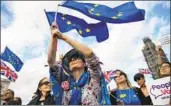  ?? Chris J Ratcliffe Getty Images ?? ANTI-BREXIT demonstrat­ors rally outside Parliament in London on Wednesday before a key vote.