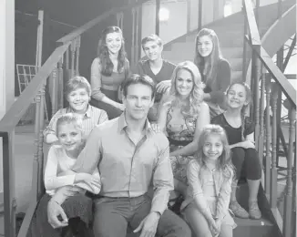  ?? NBC ?? Stephen Moyer as Capt. von Trapp, foreground centre, and Carrie Underwood as Maria, second row centre, with fellow castmates, clockwise from bottom left, Grace Rundhaug as Marta, Joe West as Kurt, Ariane Rinehart as Liesl, Michael Nigro as Friedrich,...