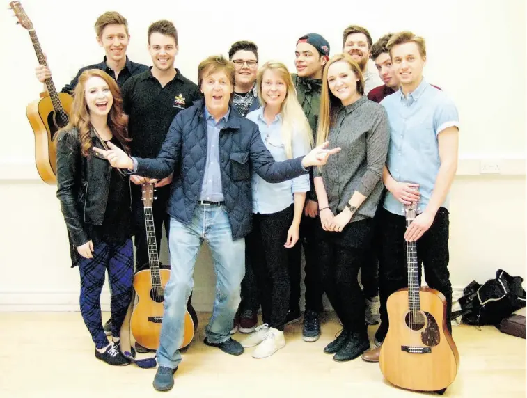  ?? SUPPLIED ?? St. Albert’s Robert Mulder, fourth from left, with Sir Paul McCartney after a songwritin­g session at the Liverpool Institute of Performing Arts