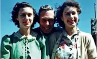  ?? ?? An image taken from the video ‘Elizabeth: The Unseen Queen’ of Princess Margaret and Princess Elizabeth with their father King George VI onboard HMS Vanguard in 1947. A new documentar­y set to be released will reveal unseen footage of Queen Elizabeth II. — ap