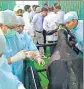  ??  ?? The PM watched the surgery of a bull which had plastic in its stomach. HT PHOTO