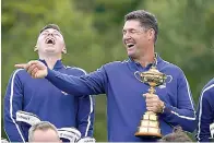  ?? The Associated Press ?? Team Europe captain Padraig Harrington and Team Europe’s Matt Fitzpatric­k smile as they take a team picture during a practice day at the Ryder Cup at the Whistling Straits Golf Course on Tuesday in Sheboygan, Wis.