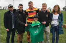  ??  ?? Irish U20 Kuba Wojtkowicz with his dad Mariusz, Head Coach Paddy Pearson, Chairperso­n Niall Gray, mum Ilona and little brother Max in Hamilton Park with his Irish jersey he presented to the club.
