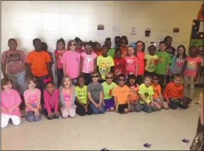  ??  ?? Bright: Junction City Elementary second graders wear their brightest clothing during Red Ribbon Week.