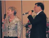  ?? Photo: TINA LAW/ FAIRFAX NZ ?? Cracking karaoke: Christchur­ch Mayor Lianne Dalziel sings a song in fluent Mandarin with a Chinese counterpar­t during a dinner in Lanzhou, Gansu province.