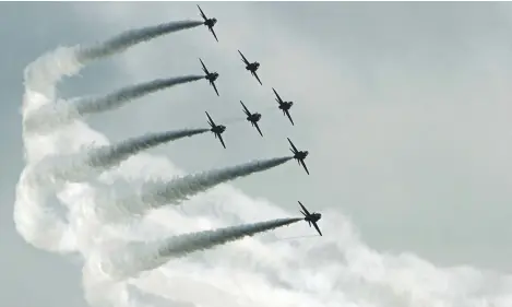  ?? Picture: Dougie Nicolson. ?? The Red Arrows, among other vintage and performing aircraft, never fail to impress.