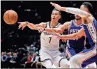  ?? Jacobson, File) ?? Brooklyn Nets guard Jeremy Lin (7) passes the ball as Philadelph­ia 76ers guards Ben Simmons, right, and JJ Redick (17) defend during the third quarter of a preseason NBA basketball game in Uniondale, N.Y., in October A person with knowledge of the...