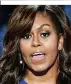  ??  ?? Schwarz und Frau: Michelle Obama beeindruck­t mit kraftvolle­m Auftritt