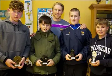  ??  ?? Killian Murphy, under-15 most improved hurler, Liam Walsh, under-15 player of the year, special guest Diarmuid O’Keeffe, Ryan Gardiner, under-15 hurler of the year, and Adam Walsh, under-15 most improved footballer at the Geraldine-O’Hanrahans Coiste na nÓg awards.