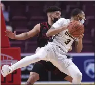  ?? BEN HASTY/MEDIANEWS GROUP ?? Archbishop Wood’s Rahsool Diggins (3) and Reading High’s Joey Chapman (5) battle for position Saturday in the PIAA 6A Boys Basketball State Championsh­ip Game at Hershey.