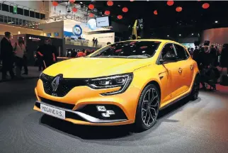  ??  ?? The new Megane RS is more extrovert than recent generation­s with a design that is said to be all about performanc­e functional­ity. Below: The new diffuser is claimed to improve downforce while the rear track has been widened by 45mm.