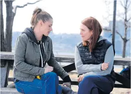  ??  ?? Kristen Stewart, left, and Julianne Moore in a scene from
Still Alice.