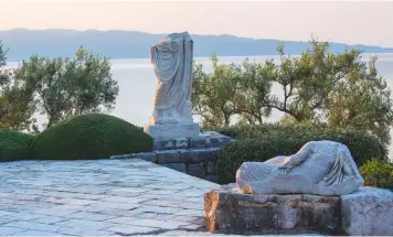  ??  ?? Statues near the pool. Jacob Rothschild is always thinking of ways to improve the garden, from moving columns and statues or planting cypresses to block the view of new houses