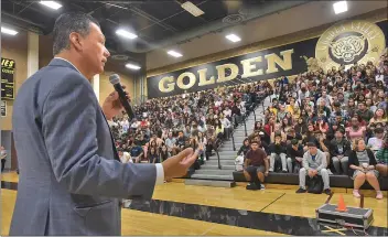  ?? Dan Watson/The Signal (See additional photos at signalscv.com) ?? California Secretary of State Alex Padilla, left, speaks to 550 Golden Valley High School students gathered in the school’s gymnasium Wednesday. His message was to encourage early voter registrati­on.