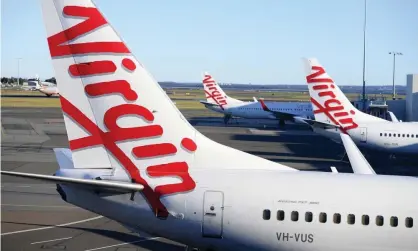  ?? Photograph: Dan Himbrechts/AAP ?? The Transport Workers Union wants urgent clarificat­ion that Virgin Australia’s new owners will stand by their commitment­s, including to keep on 6,000 staff.