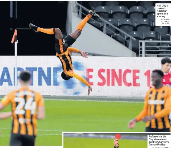  ?? RICHARD SELLERS/ PA WIRE ?? Hull City’s Hakeeb Adelakun opens the scoring