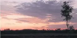  ?? JADA YUAN THE NEW YORK TIMES ?? A sunset outside Litchfield National Park, Top End.