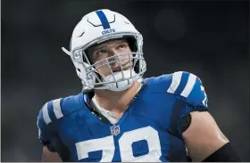  ?? ZACH BOLINGER - THE ASSOCIATED PRESS ?? FILE - Indianapol­is Colts center Ryan Kelly watches a replay during the team’s NFL football game against the Jacksonvil­le Jaguars on Nov. 14, 2021, in Indianapol­is. Mary Kate, the infant daughter of Kelly and his wife, Emma, died about two weeks ago.