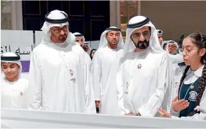  ?? Wam ?? Dubai Ruler and Abu Dhabi Crown Prince interact with children during the meeting. —