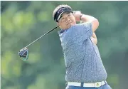  ?? AFP ?? Kiradech Aphibarnra­t plays a shot during the Memorial Tournament.