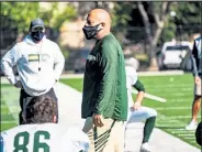  ?? BRANDON RANDALL / Courtesy of CSU Athletics ?? Colorado State head coach Steve Addazio talks with his players during a practice Sept. 29 in Fort Collins.