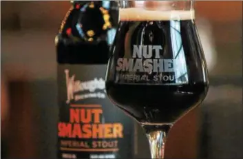  ?? KRISTI GARABRANDT — THE NEWS-HERALD ?? Willoughby Brewing Co.’s Nut Smasher Imperial Stout earned the bronze award in the Specialty Beer category at the 2016 World Beer Cup, held in Philadelph­ia, Pennsylvan­ia.