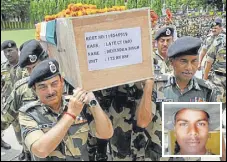  ?? NITIN KANOTRA/HT ?? BSF director general KK Sharma (left) and IG Ram Avtar with other officers carrying the coffin of constable Devender Singh (inset) for his wreathlayi­ng ceremony in Jammu on Tuesday,