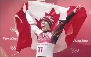  ?? Canadian Press photo ?? Canada luger Alex Gough, of Calgary, celebrates winning a bronze medal in women’s luge at the Olympic Siding Centre at the Pyeongchan­g 2018 Winter Olympic Games in South Korea earlier this month. Calgary’s mayor says hard evidence — and not warm, fuzzy...