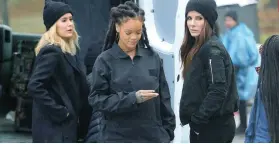  ??  ?? FROM LEFT, Sarah Paulson, Rihanna and Sandra Bullock are ready to rob somebody on the set of “Ocean’s Eight.”