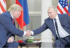  ?? Picture: Getty. ?? Donald Trump shaking hands with Russian president Vladmir Putin.