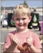 ?? PHOTO BY JESI YOST — FOR MEDIANEWS GROUP ?? Ryker Leofsky, 5, of Gilbertsvi­lle shows off his pretzel necklace, made and sold at Boyertown’s Oktoberfes­t by New Hanover Evangelica­l Lutheran Church.