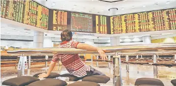  ??  ?? MSWG hopes the CGT will not be introduced in the near term as it will further dampen the performanc­e of Bursa Malaysia. It stressed that the introducti­on of the tax on capital gains would be counter productive as the government had plans to reduce shares owned by GLICs. — AFP photo
