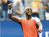  ?? ELSA/GETTY ?? Frances Tiafoe, above, a 24-year-old from Maryland, will face 19-year-old Carlos Alcaraz of Spain in the semifinals of the U.S. Open on Friday night in New York.