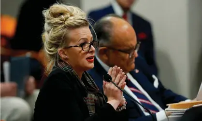  ??  ?? Melissa Carone speaks in front of the Michigan House Oversight Committee in Lansing, Michigan, on Wednesday. Photograph: Jeff Kowalsky/AFP/Getty Images