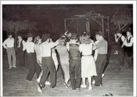  ??  ?? Director Shaner (far left) observing a Plain Dutch “Amish Barn Dance” in the late 1960s.
