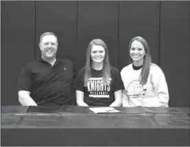  ?? Sue Licking ?? Kylie Licking of Mullen signed her letter of intent to play volleyball at NPCC next fall on Dec. 11 at Mullen High School. Pictured above L to R are her father Roger, Kylie, and her mom Sue.