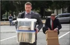  ?? LAURIE SKRIVAN — ST. LOUIS POST-DISPATCH VIA AP ?? Former St. Louis city police officer Jason Stockley, 36, center, arrives with his legal team on Tuesday at the Carnahan Courthouse in St. Louis. Opening statements started Tuesday for Jason Stockley, who is charged with first-degree murder and armed...