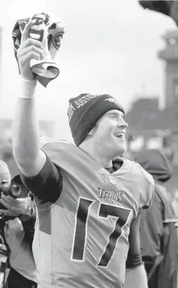  ?? WESLEY HITT/GETTY ?? Titans quarterbac­k Ryan Tannehill reacts as he walks off the field after defeating the Dolphins 34-3 Sunday at Nissan Stadium in Nashville, Tennessee.