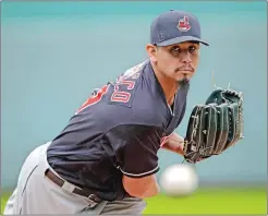  ?? CHARLIE RIEDEL/AP PHOTO ?? In this Sept. 30 file photo, Cleveland Indians starting pitcher Carlos Carrasco throws during the first inning of a game against the Kansas City Royals in Kansas City, Mo.