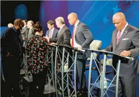  ?? BRIAN WITTE/AP ?? From right, Rushern Baker, Wes Moore, Doug Gansler and Jon Baron stand at their lecterns just before a debate of eight candidates seeking the Democratic nomination for governor of Maryland on June 6 in Owings Mills.
